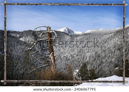 framed scenery pictures of mountains in Idaho with blue sky and white fluffy clounds