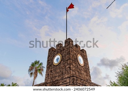 Scenic view of a Turkish flag on an old tower Royalty-Free Stock Photo #2406072549