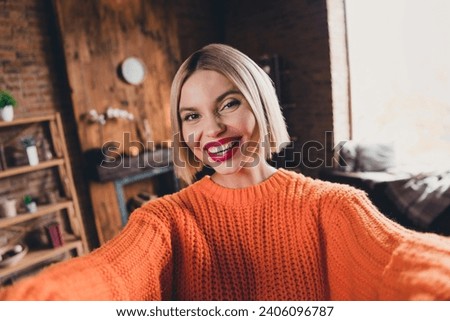 Portrait of cute cheerful person make selfie beaming smile good mood enjoy free time modern house inside