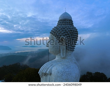 aerial photography scenery blue sky and blue ocean behind Phuket white big Buddha.

Fog cover Phuket white big Buddha is the famous landmark in Phuket.