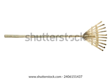 Bamboo rake is a natural material woven and tied with rope, used for sweeping or hooking things that need to be cleaned. Royalty-Free Stock Photo #2406151437