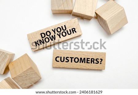 DO YOU KNOW YOUR CUSTOMERS on wooden blocks on white background Royalty-Free Stock Photo #2406181629