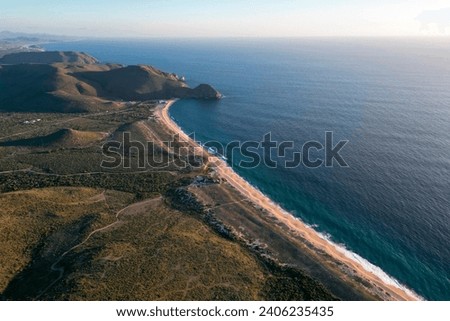 drone aerial sunset view of todos santos mexico baja california sur from mirador viewpoint lookout Royalty-Free Stock Photo #2406235435