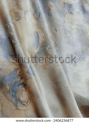 Sweet fabric pattern texture  Light blue with flowing floral patterns, vaguely resembling a classic painting.  background for women. Copyspace.