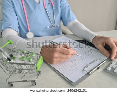 Virologist sells vaccines in clinic. Vaccine delivery concept and vaccination Royalty-Free Stock Photo #2406242151