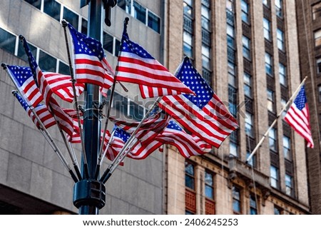 American flags waving on the lampposts of the Big Apple districts, as in the whole Manhattan of New York, in the United States of America.