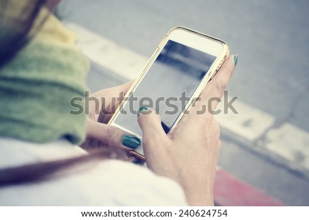 Woman using smart phone Royalty-Free Stock Photo #240624754