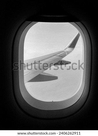 Black and white airplane window photography