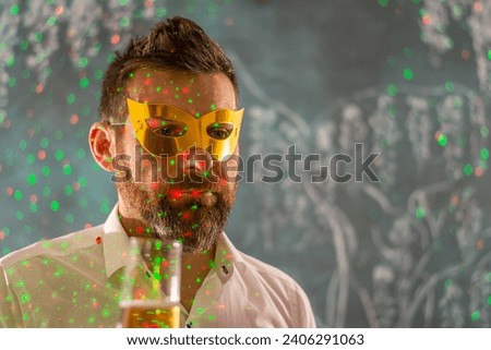 Happy man celebrating birthday on color background. Party concept. New year concept.