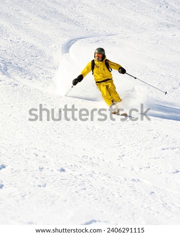 Ski instructor skiing in Courchevel off piste, Valley Des Avals, French Alps, France Royalty-Free Stock Photo #2406291115