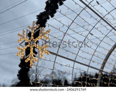 led chains in dense spacing on coiled and attached to the metal structure. creates light surfaces and decorative ornaments at night. Christmas decorations , wall, tent, figures, prepare. marketing