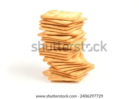 Square shortbread cookies isolated on white background. Stacked butter biscuits for coffee or tee. High resolution photo. Full depth of field.