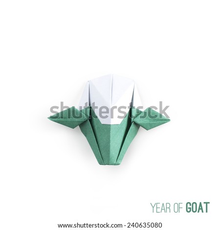 Origami goat paper craft on white background for Happy New Year 2015, the year of Goat