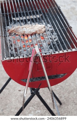Pictures of the atmosphere of grilling steak in a temple for family relaxation.