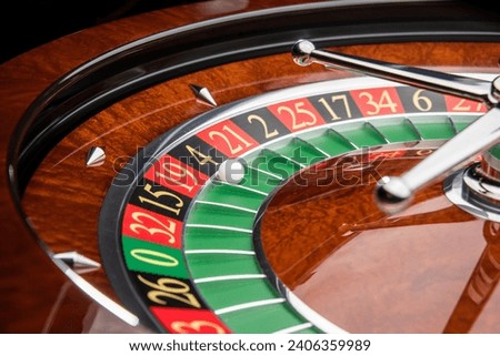 Close up roulette wheel white ball Royalty-Free Stock Photo #2406359989