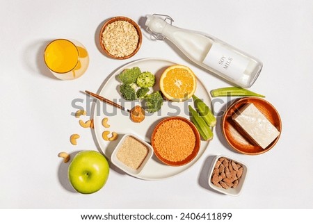 Foods for lowering cholesterol, tofu, lentils, okra, nuts, soy milk and other. Portfolio diet products, top view