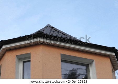 house with roof and windows, blue sky, photo