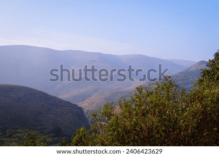 selective focus picture of the green mountains