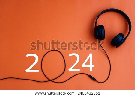happy new year 2024. Year 2024 with headphones. creativity inspiration, planning ideas concept. Colorful background. 