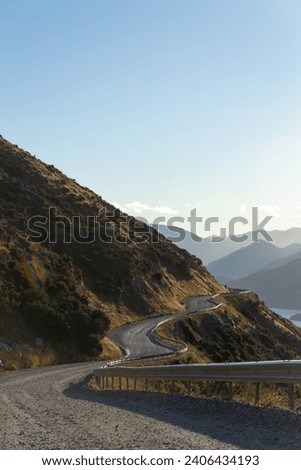 Old gravel road winding its way up to the Remarkables Range skifield