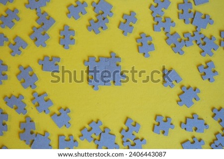 Puzzles sign of Team work with yellow background