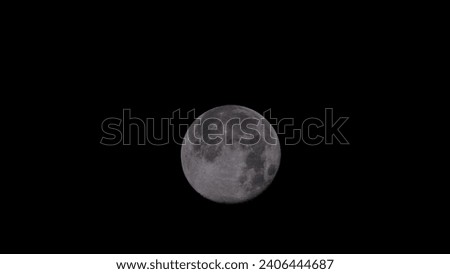 High resolution photo of full moon at dusk