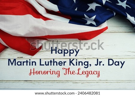Happy Martin Luther King Jr Day text messege  with USA flag on wooden background