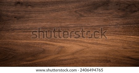Walnut wood texture background. Wide format black walnut natural texture desktop background.	 Royalty-Free Stock Photo #2406494765