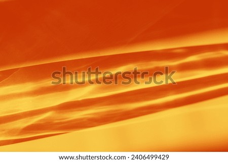 Sunlight background, abstract photo with light and shadow, glare and shiny texture, rainbow flare,red orange colored monochrome minimal photo. Natural light and caustic effects, trend aesthetic fon.