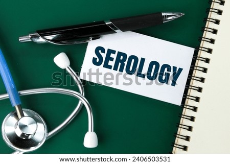 Pen, stethoscope and colored paper with the word Serology. science and medicine concepts Royalty-Free Stock Photo #2406503531