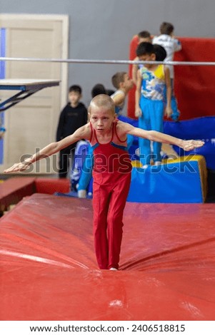 sport boy doing exercise in competition, sport gymnastics 
