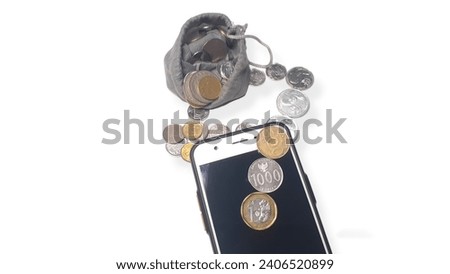 Smart phone and coins stack,  mobile payment concept, isolated on white background.Shotlistbanking.