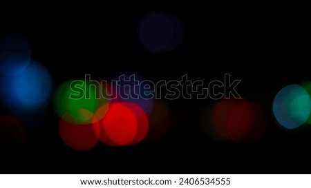 Blurred bokeh light on dark background