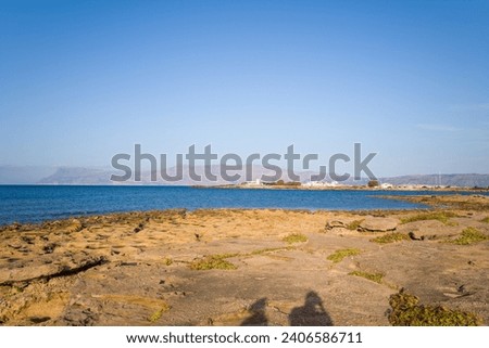 The port of Kissamos , in Europe, in Greece, in Crete, towards Kissamos, towards Chania, By the Mediterranean sea, in summer, on a sunny day. Royalty-Free Stock Photo #2406586711
