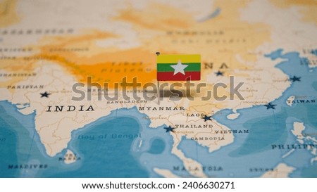 The Map and Flag of Myanmar. Royalty-Free Stock Photo #2406630271
