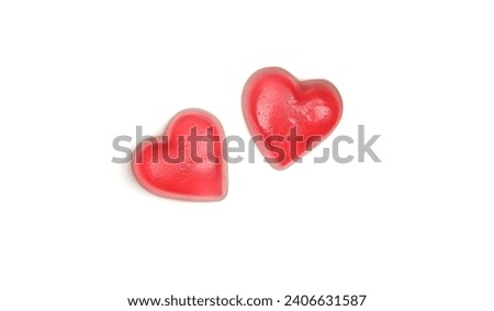 Two heart shaped jelly gummy treats isolated on white background