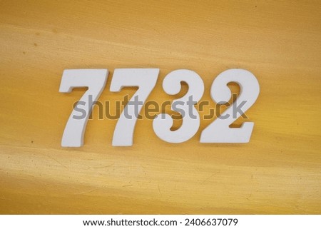 The golden yellow painted wood panel for the background, number 7732, is made from white painted wood.