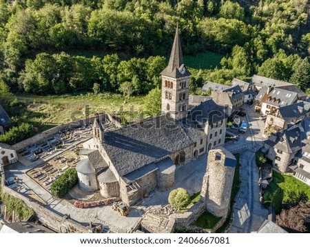 Arties village church in Lerida Catalonia of Spain Pyrenees in Aran Valley, Cataloged of the most beautiful villages in Spain Royalty-Free Stock Photo #2406667081