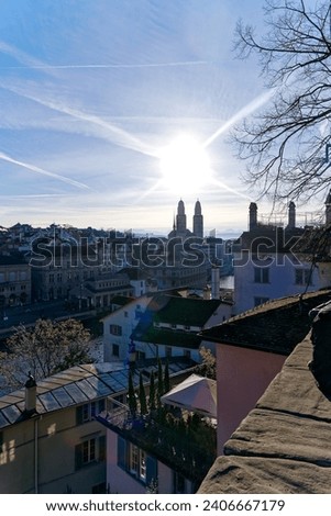 Aerial view of the old town of Swiss City of Zürich with Great Minster church in the background on a sunny winter morning. Photo taken December 30th, 2023, Zurich, Switzerland.