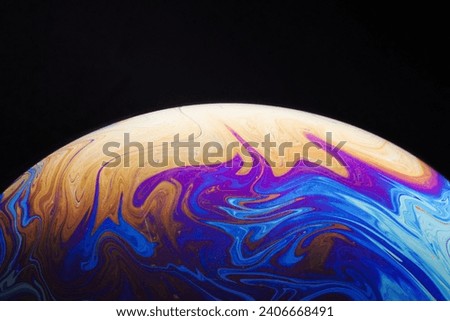 gradient saturated colorful soap bubble black background