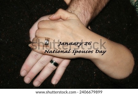 National Spouses Day January 26 26th. Man woman holding hands. Wedding bands rings. Partners. Love commitment marriage. Annual event. Husband wife. Royalty-Free Stock Photo #2406679899