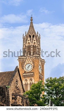 Close up image of Iconic , Ancient Rajabai Tower building with clock and nice carvings in Mumbai, India.