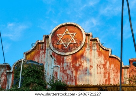  jewish star of david on an old colonial building in fort kochi                               Royalty-Free Stock Photo #2406721227