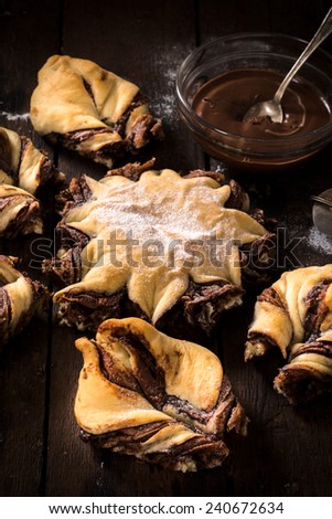 Sliced homemade chocolate bread on wooden background,selective focus