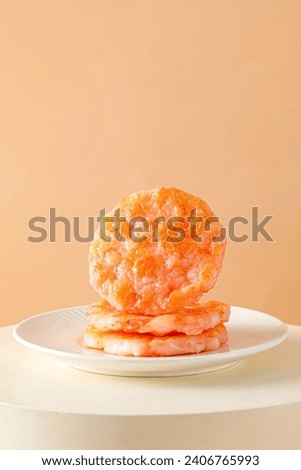 Shrimp steaks, snack made with shrimps and vegetables, children's food fried, golden and pink meat texture, closeup on tabletop indoors
