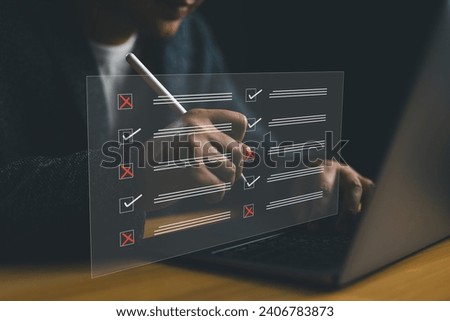 Document management system DMS. Assessment form, questionnaire, checklist and clipboard task management. Businessman working on laptop computer filling survey form online and productivity checklist.