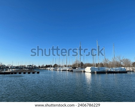 Boats parking, water platforms, cruise, blue background, view.