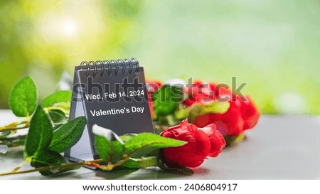 Valentine's Day 2024 Concept. On February 14, the calendar marks a day of love, as red hearts adorn spaces, epitomizing Valentine's Day, a celebration of romance and affection. Royalty-Free Stock Photo #2406804917