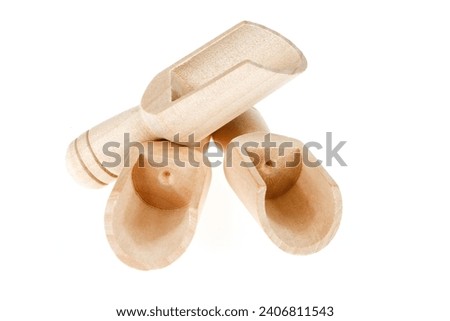 
Wooden shovel on a white background, close-up pictures