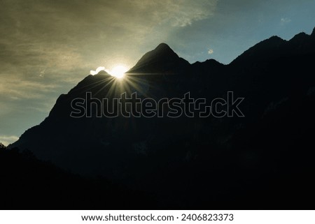 Sunrise light on the mountain ridge in the morning.